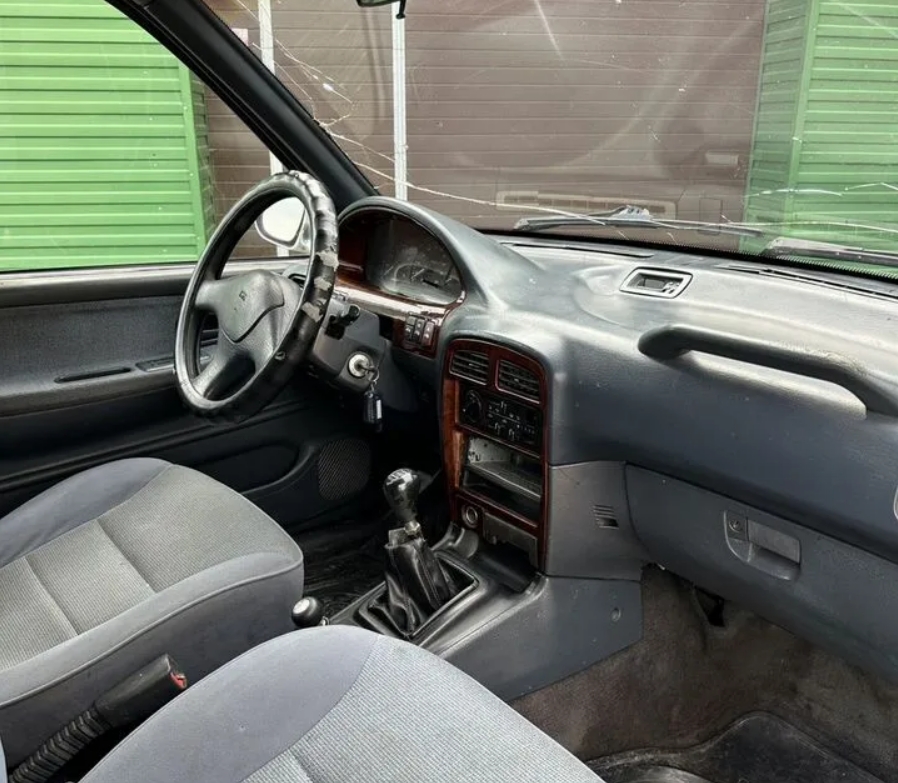 Kia Sportage (K00) 2.0 i 16V (128 лс) фото салона
