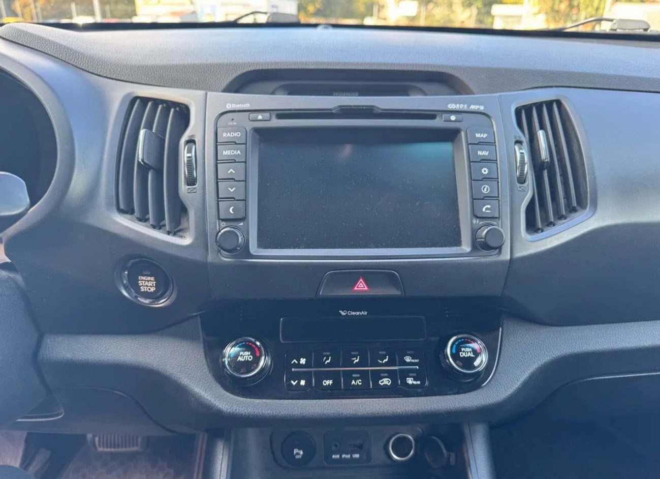 Kia Sportage 3 фото центральной консоли, мультимедийного экрана