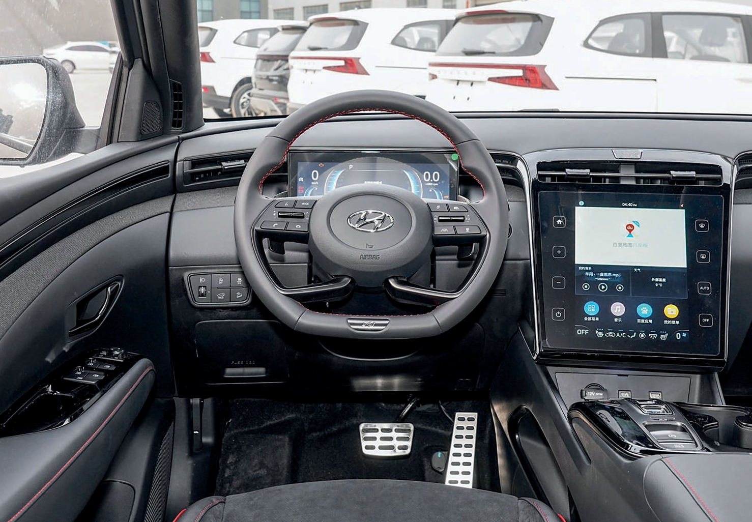 Hyundai Tucson GLS фото руля, панели, мультимедии,
